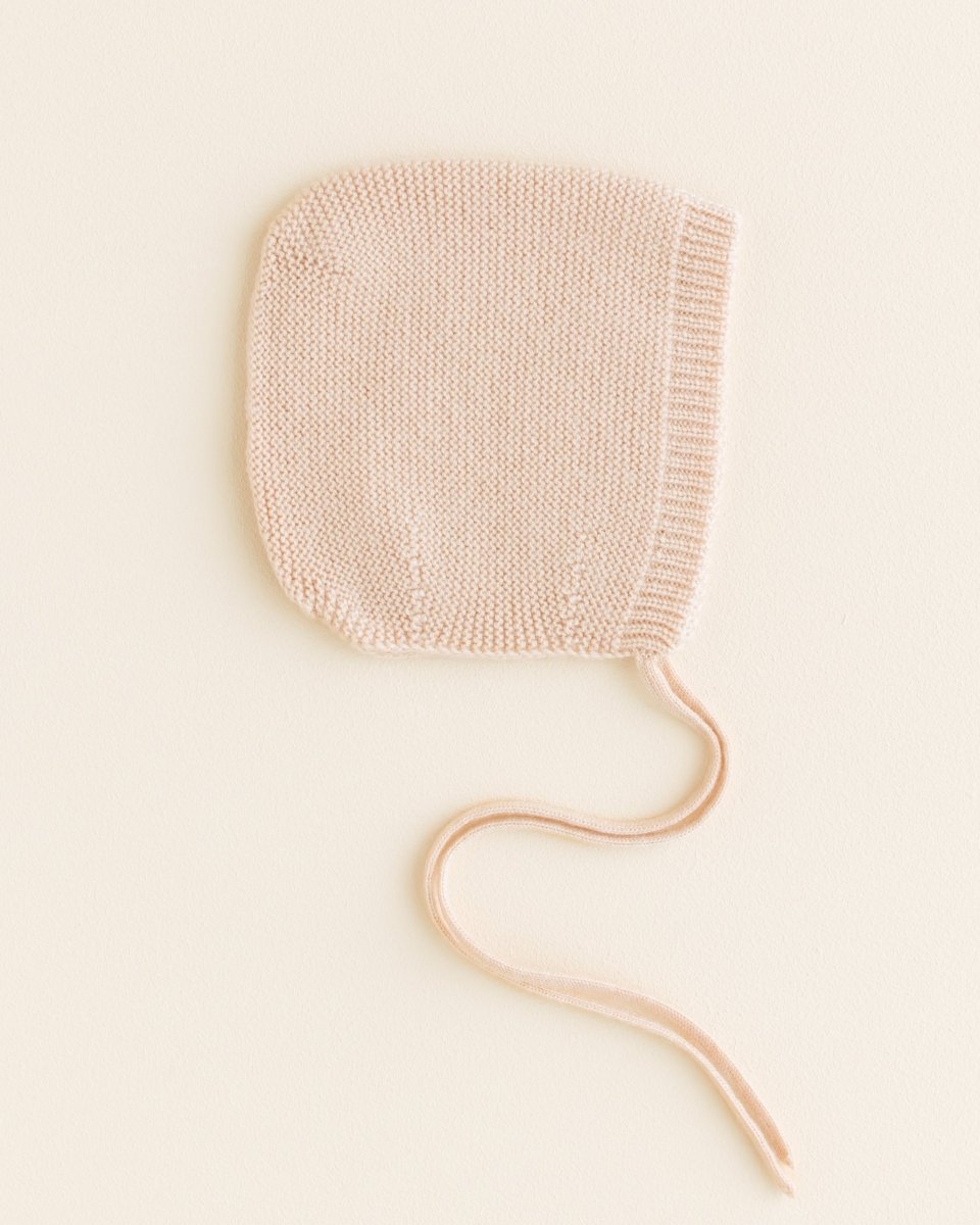 Bonetka z wełny merino Newborn Oat - Hvid
