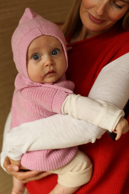 Kamizelka z wełny merino Harvey Baby Cotton Candy - Hvid