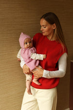 Kamizelka z wełny merino Harvey Baby Cotton Candy - Hvid