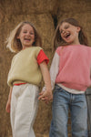 Kamizelka z wełny merino Harvey Kids Sand - Hvid