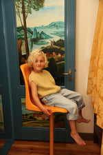 Kamizelka z wełny merino Harvey Kids Sand - Hvid