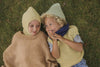 Kamizelka z wełny merino Harvey Kids Sand - Hvid