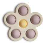 Sensoryczna zabawka press toy - kwiatek Soft Lilac - Mushie